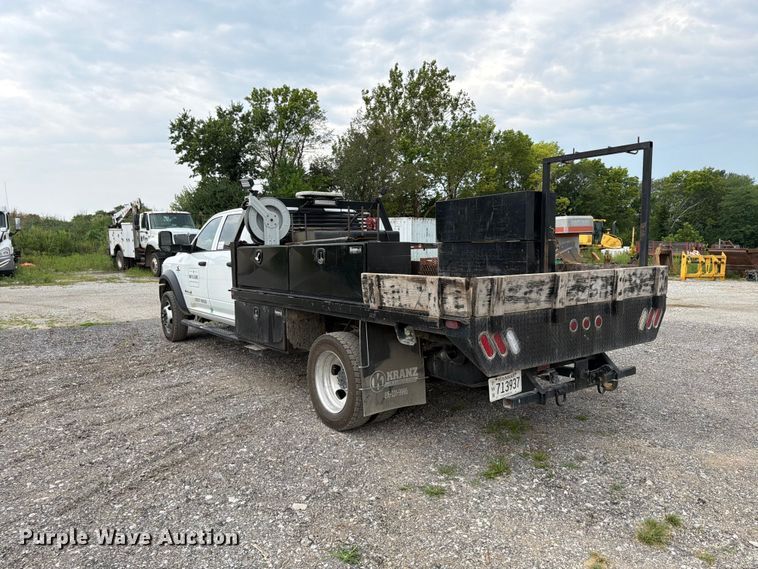image for item FN5798 2022 RAM 5500 Crew Cab flatbed truck