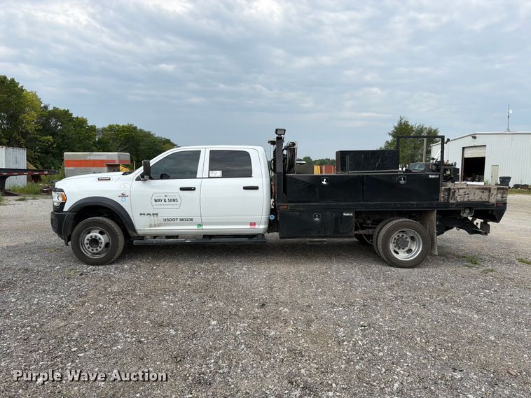image for item FN5798 2022 RAM 5500 Crew Cab flatbed truck
