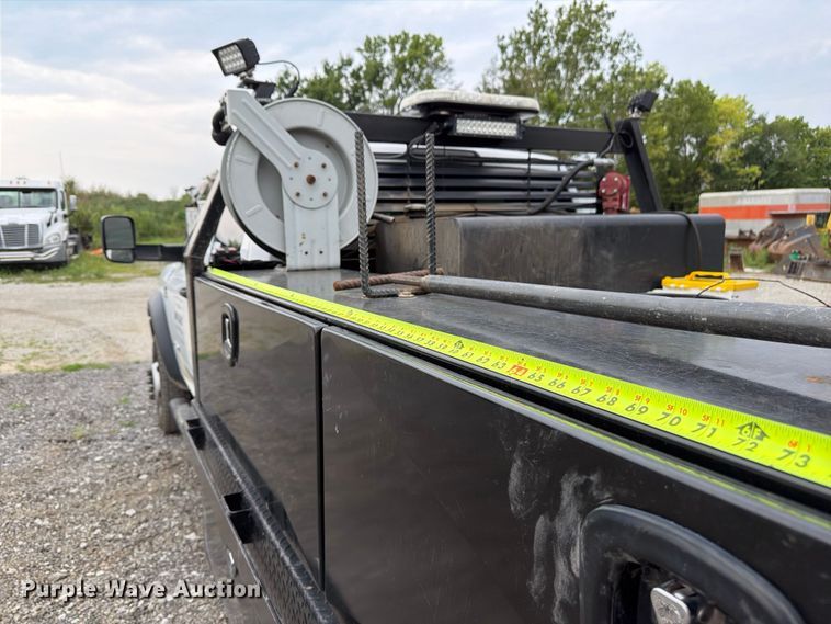 image for item FN5798 2022 RAM 5500 Crew Cab flatbed truck