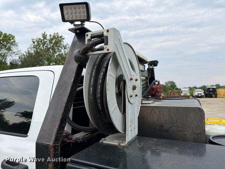 image for item FN5798 2022 RAM 5500 Crew Cab flatbed truck