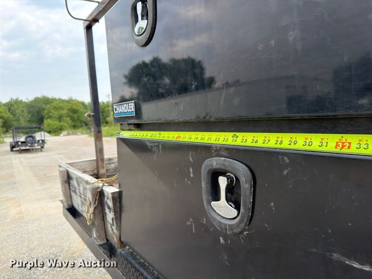 image for item FN5798 2022 RAM 5500 Crew Cab flatbed truck