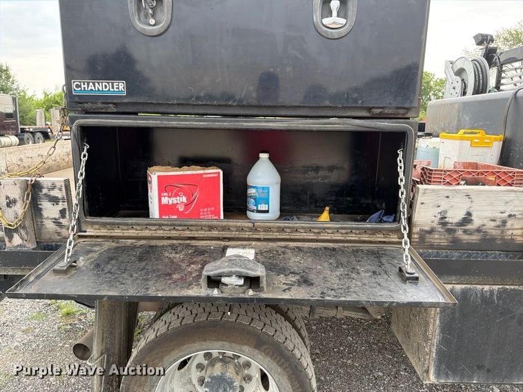 image for item FN5798 2022 RAM 5500 Crew Cab flatbed truck