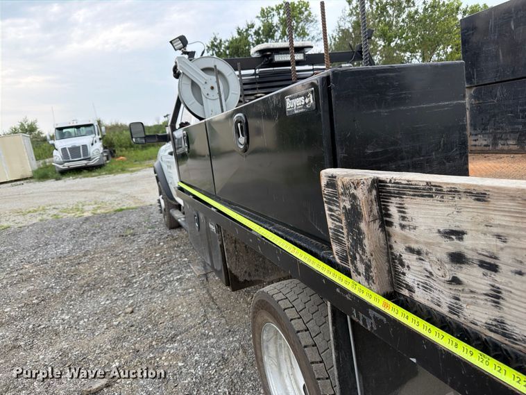 image for item FN5798 2022 RAM 5500 Crew Cab flatbed truck