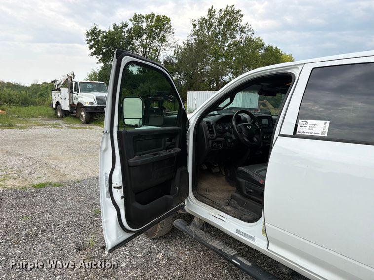 image for item FN5798 2022 RAM 5500 Crew Cab flatbed truck