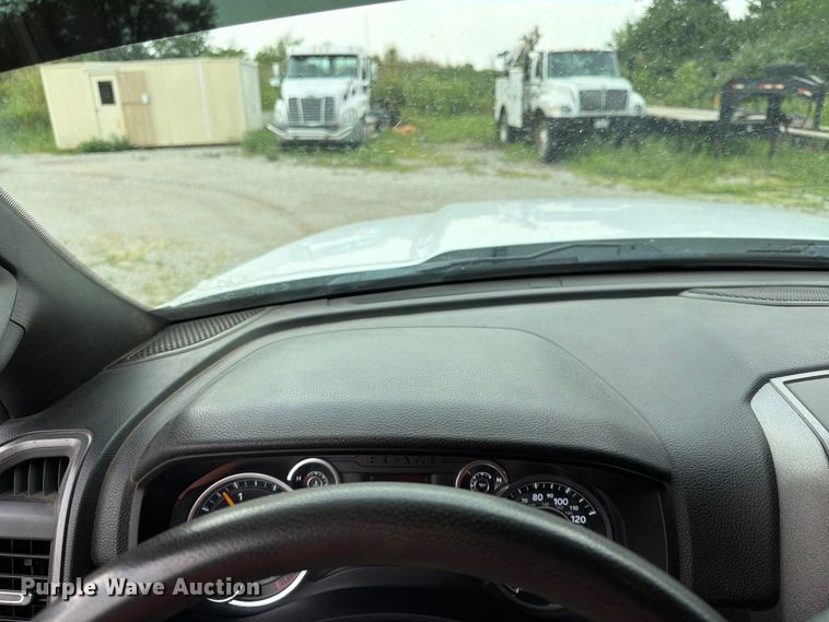image for item FN5798 2022 RAM 5500 Crew Cab flatbed truck