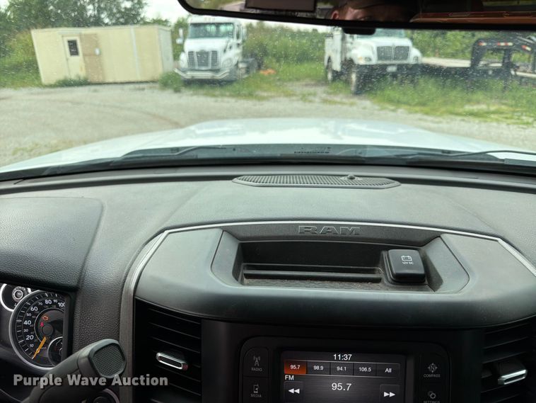 image for item FN5798 2022 RAM 5500 Crew Cab flatbed truck