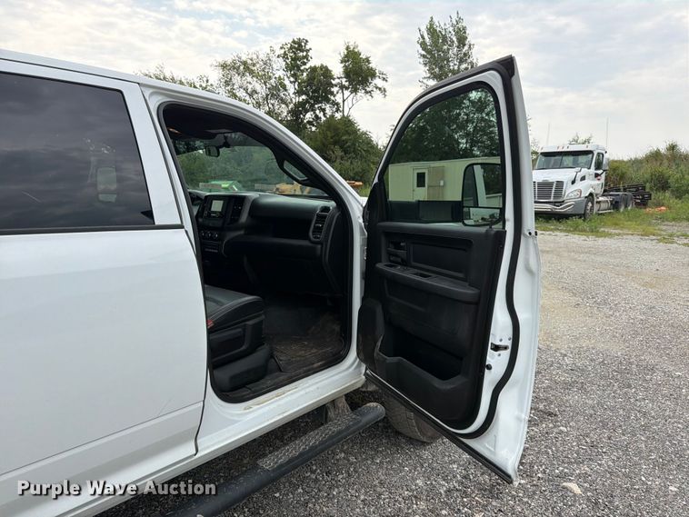 image for item FN5798 2022 RAM 5500 Crew Cab flatbed truck