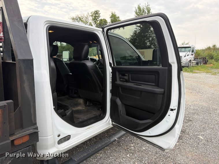 image for item FN5798 2022 RAM 5500 Crew Cab flatbed truck
