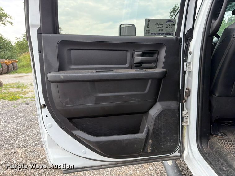 image for item FN5798 2022 RAM 5500 Crew Cab flatbed truck