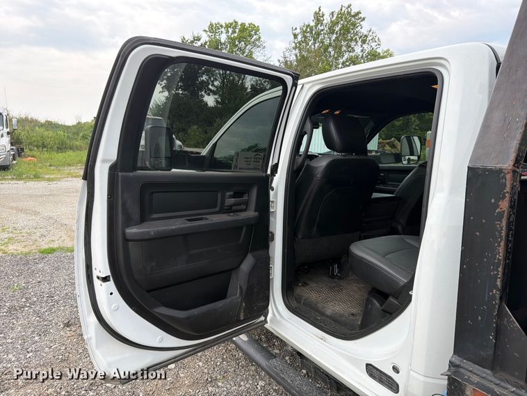 image for item FN5798 2022 RAM 5500 Crew Cab flatbed truck
