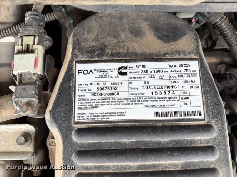 image for item FN5798 2022 RAM 5500 Crew Cab flatbed truck