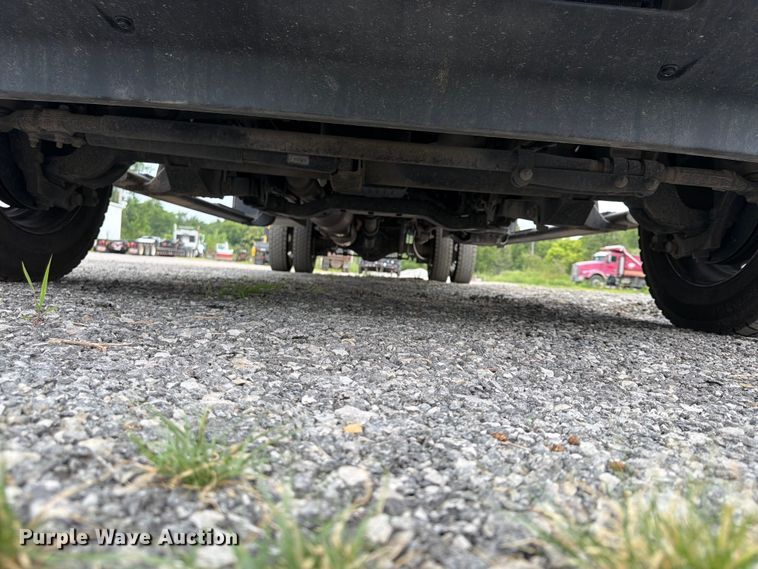 image for item FN5798 2022 RAM 5500 Crew Cab flatbed truck