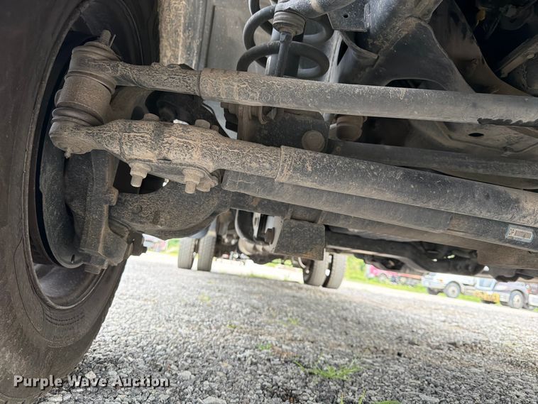 image for item FN5798 2022 RAM 5500 Crew Cab flatbed truck