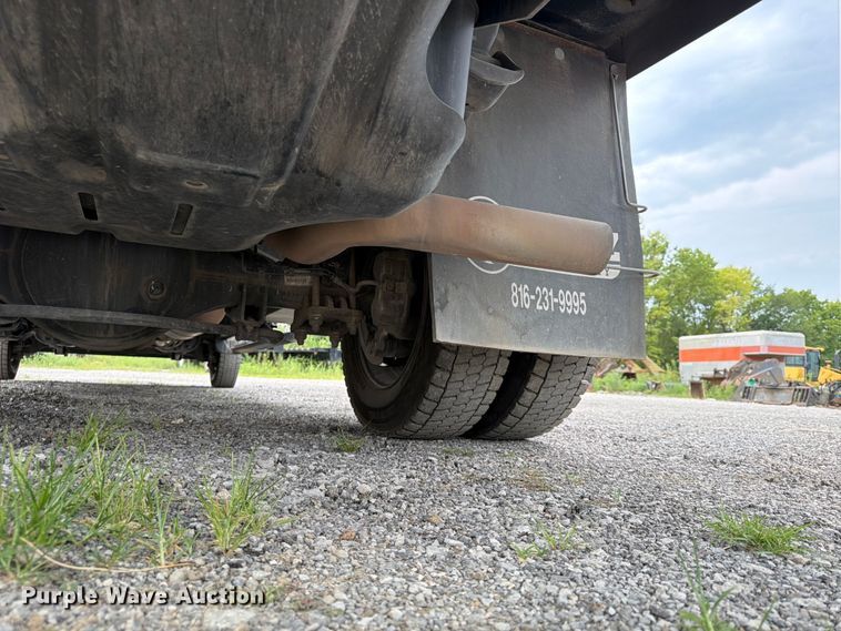 image for item FN5798 2022 RAM 5500 Crew Cab flatbed truck