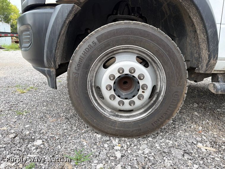 image for item FN5798 2022 RAM 5500 Crew Cab flatbed truck