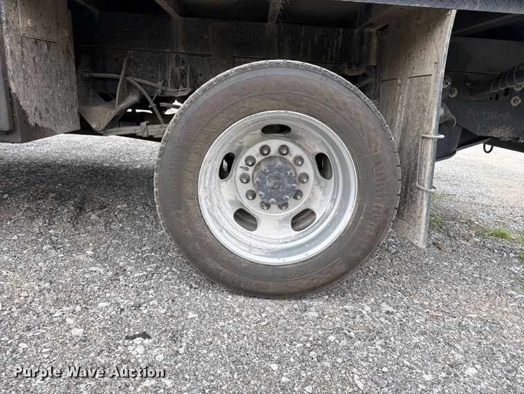 image for item FN5798 2022 RAM 5500 Crew Cab flatbed truck