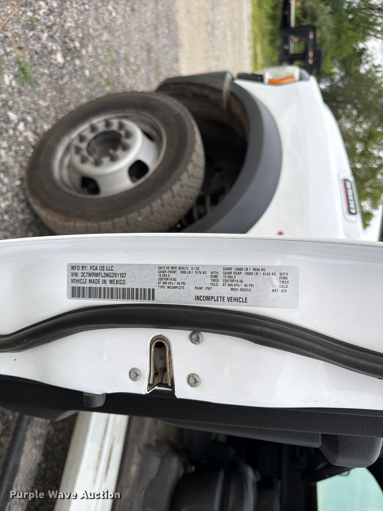 image for item FN5798 2022 RAM 5500 Crew Cab flatbed truck