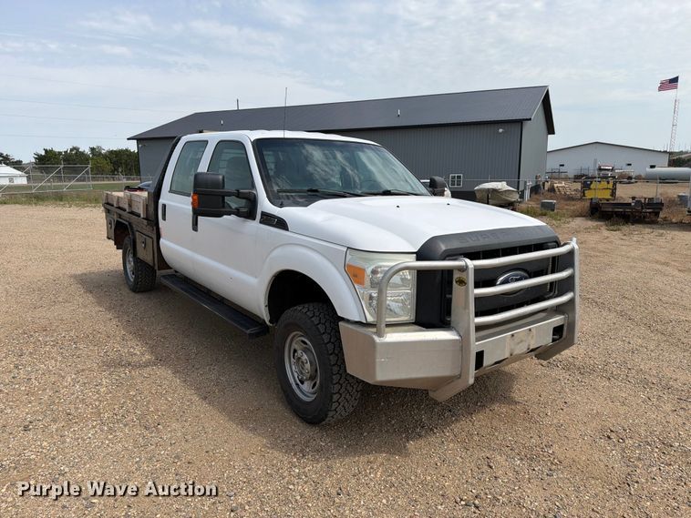 image for item FT6691 2015 Ford F250 Super Duty Crew Cab flatbed pickup truck