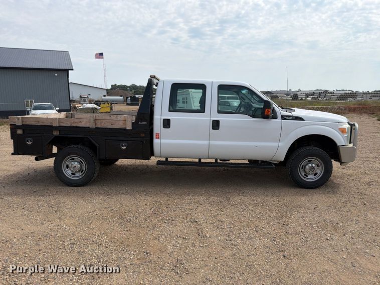 image for item FT6691 2015 Ford F250 Super Duty Crew Cab flatbed pickup truck