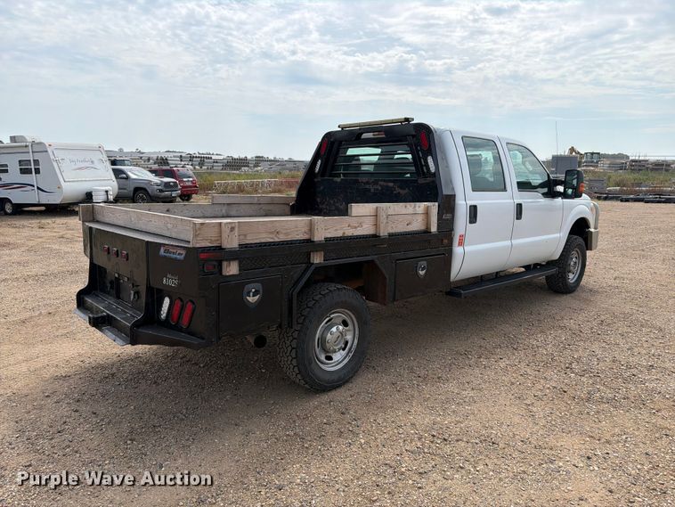 image for item FT6691 2015 Ford F250 Super Duty Crew Cab flatbed pickup truck