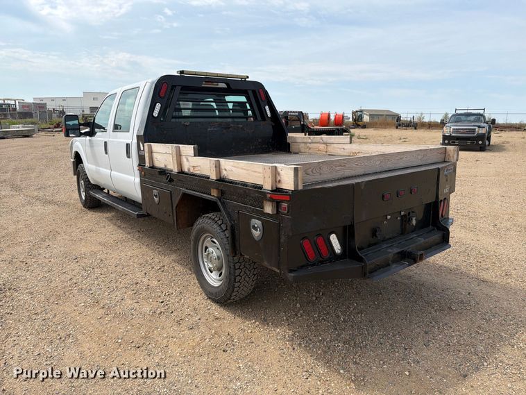 image for item FT6691 2015 Ford F250 Super Duty Crew Cab flatbed pickup truck