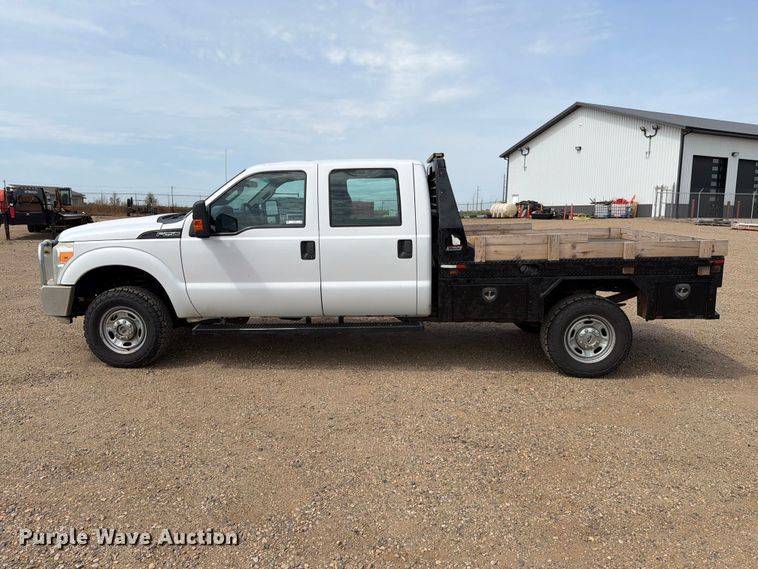 image for item FT6691 2015 Ford F250 Super Duty Crew Cab flatbed pickup truck
