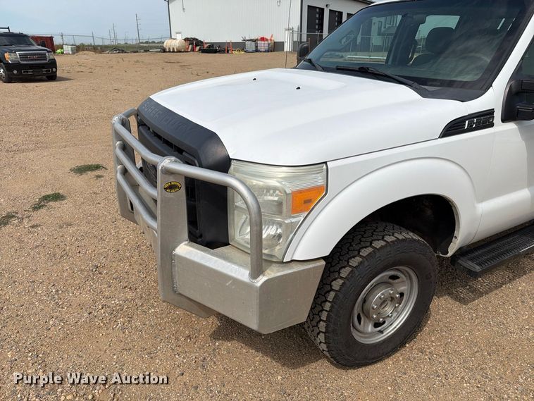 image for item FT6691 2015 Ford F250 Super Duty Crew Cab flatbed pickup truck