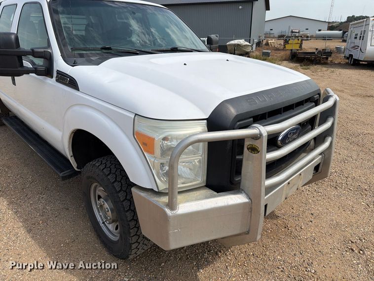 image for item FT6691 2015 Ford F250 Super Duty Crew Cab flatbed pickup truck