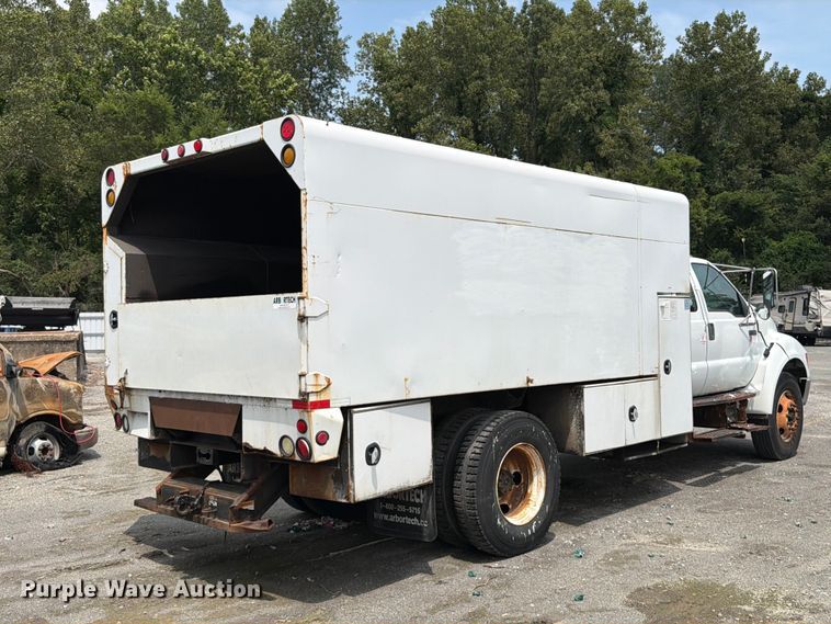 image for item YA3901 2010 Ford F750 Super Duty XL Crew Cab chipper truck