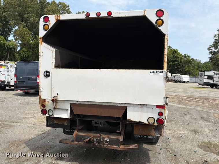 image for item YA3901 2010 Ford F750 Super Duty XL Crew Cab chipper truck