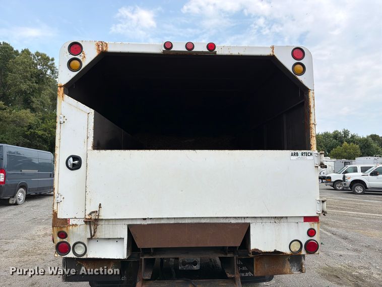 image for item YA3901 2010 Ford F750 Super Duty XL Crew Cab chipper truck