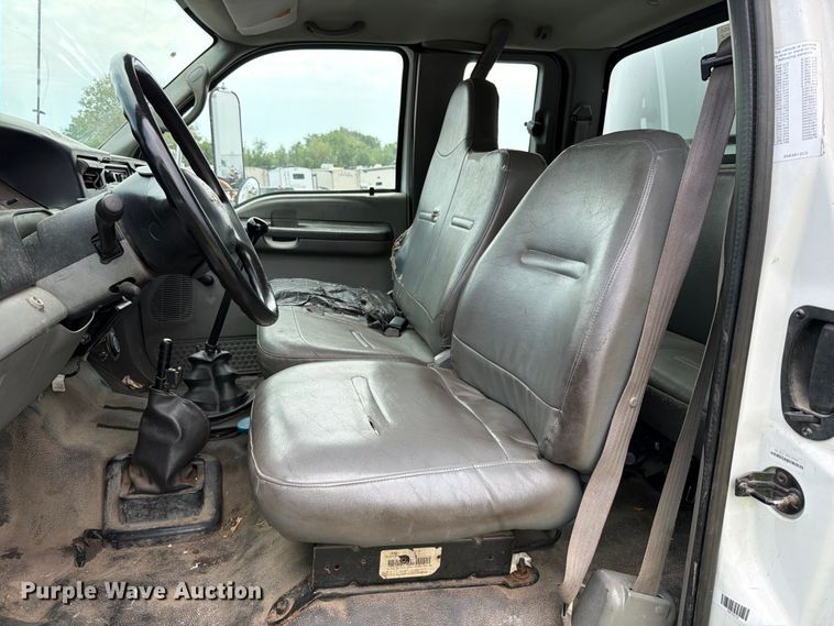 image for item YA3901 2010 Ford F750 Super Duty XL Crew Cab chipper truck