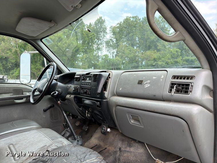image for item YA3901 2010 Ford F750 Super Duty XL Crew Cab chipper truck