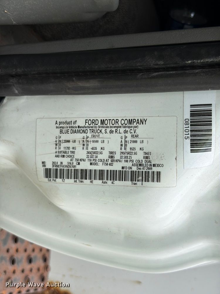 image for item YA3901 2010 Ford F750 Super Duty XL Crew Cab chipper truck