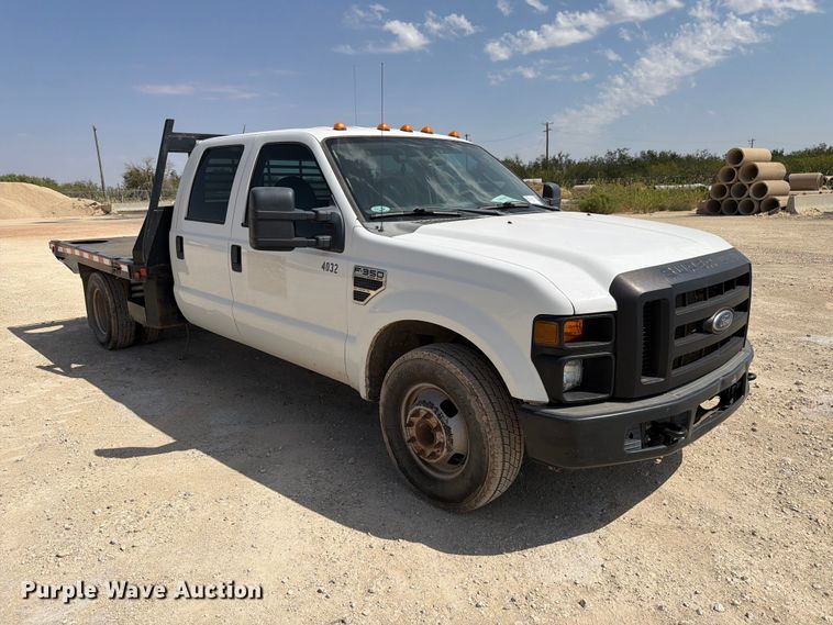 image for item DV8614 2009 Ford F350 Super Duty Crew Cab flatbed pickup truck