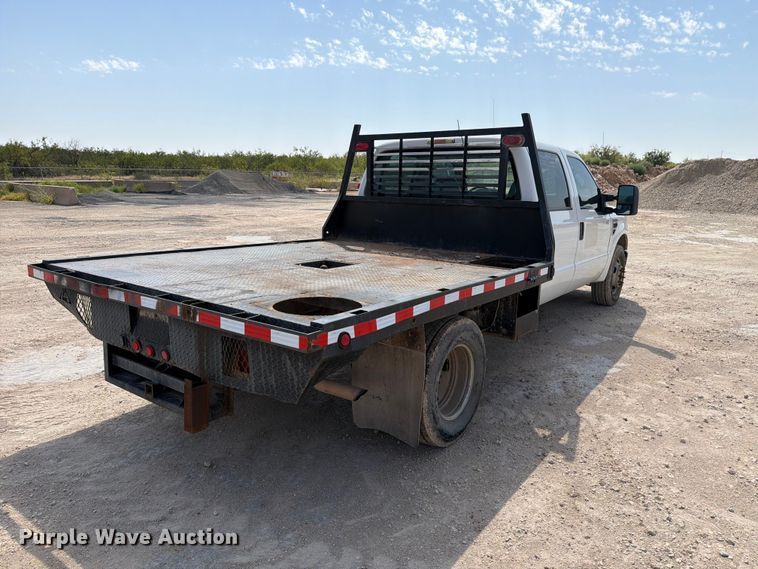 image for item DV8614 2009 Ford F350 Super Duty Crew Cab flatbed pickup truck