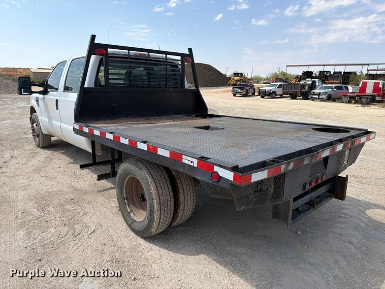 image for item DV8614 2009 Ford F350 Super Duty Crew Cab flatbed pickup truck