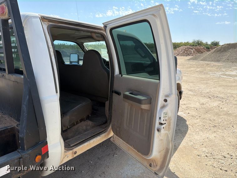 image for item DV8614 2009 Ford F350 Super Duty Crew Cab flatbed pickup truck
