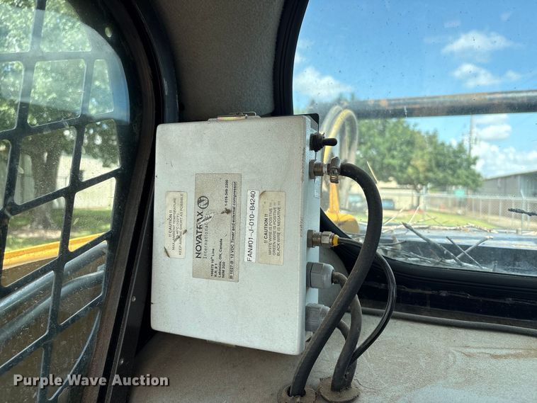 image for item EU0781 Caterpillar 299C tracked skid steer loader