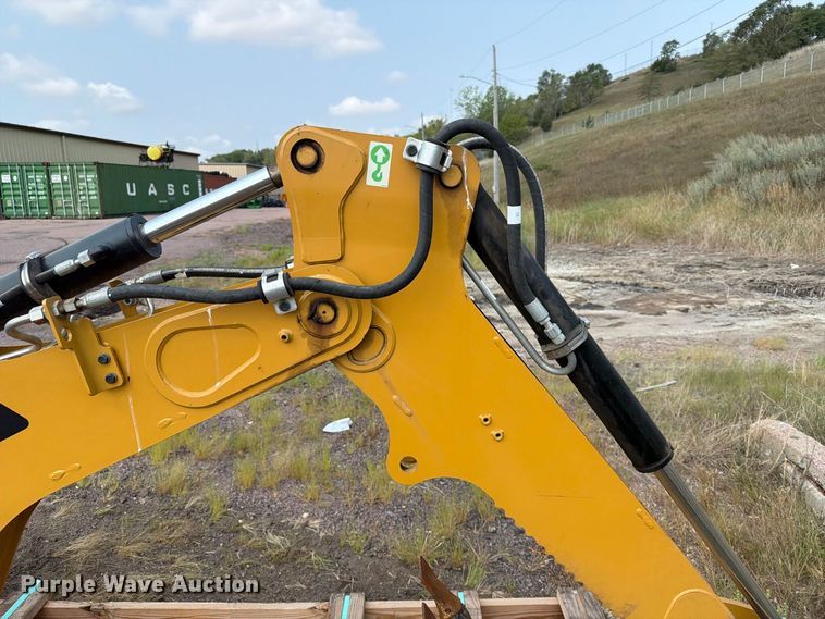 image for item FT6536 2013 Caterpillar BH150 skid steer backhoe