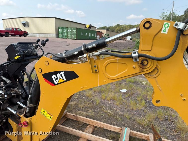 image for item FT6536 2013 Caterpillar BH150 skid steer backhoe
