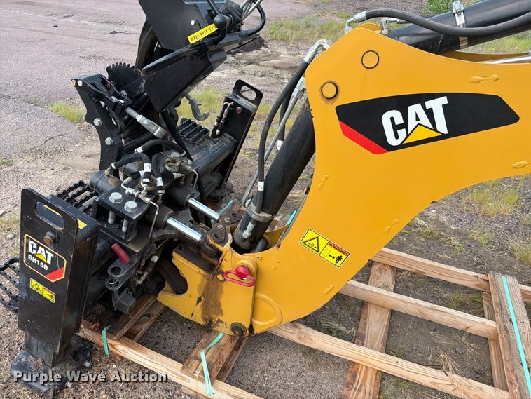 image for item FT6536 2013 Caterpillar BH150 skid steer backhoe