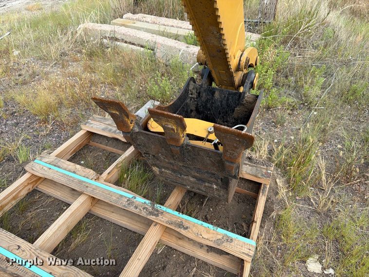 image for item FT6536 2013 Caterpillar BH150 skid steer backhoe