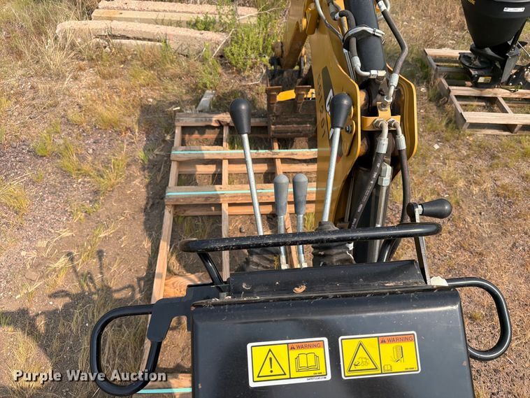 image for item FT6536 2013 Caterpillar BH150 skid steer backhoe