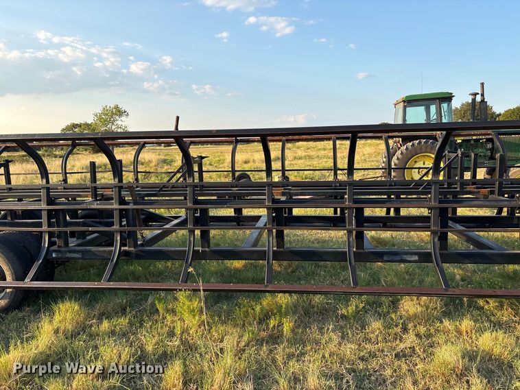 image for item EX0028 Industrias America 20X4 hay bale trailer