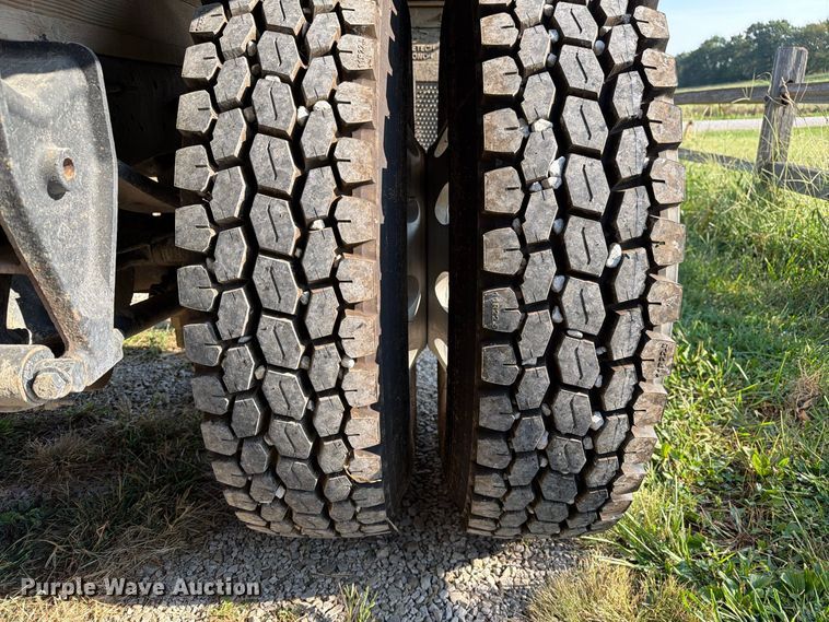 image for item DZ4750 2000 International 4700 Low Profile flatbed truck