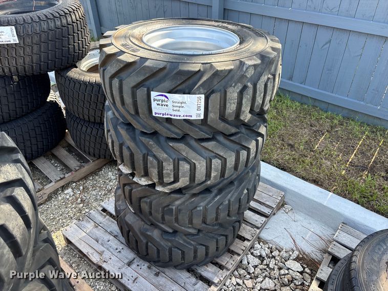 (4) 12-16.5 tires and wheels