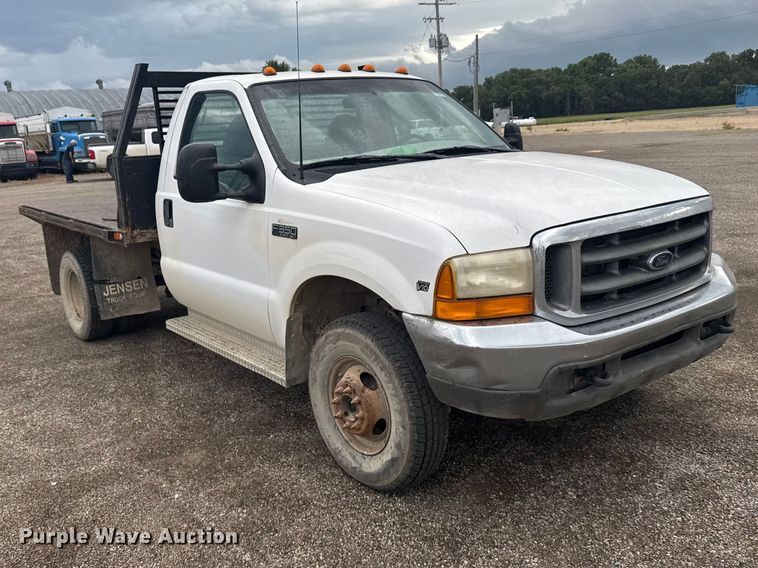image for item DY3227 1999 Ford F350 flatbed pickup truck