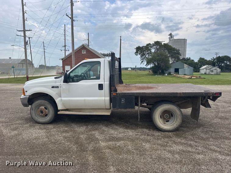 image for item DY3227 1999 Ford F350 flatbed pickup truck
