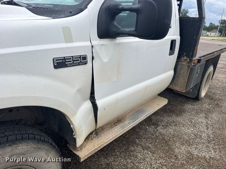 image for item DY3227 1999 Ford F350 flatbed pickup truck